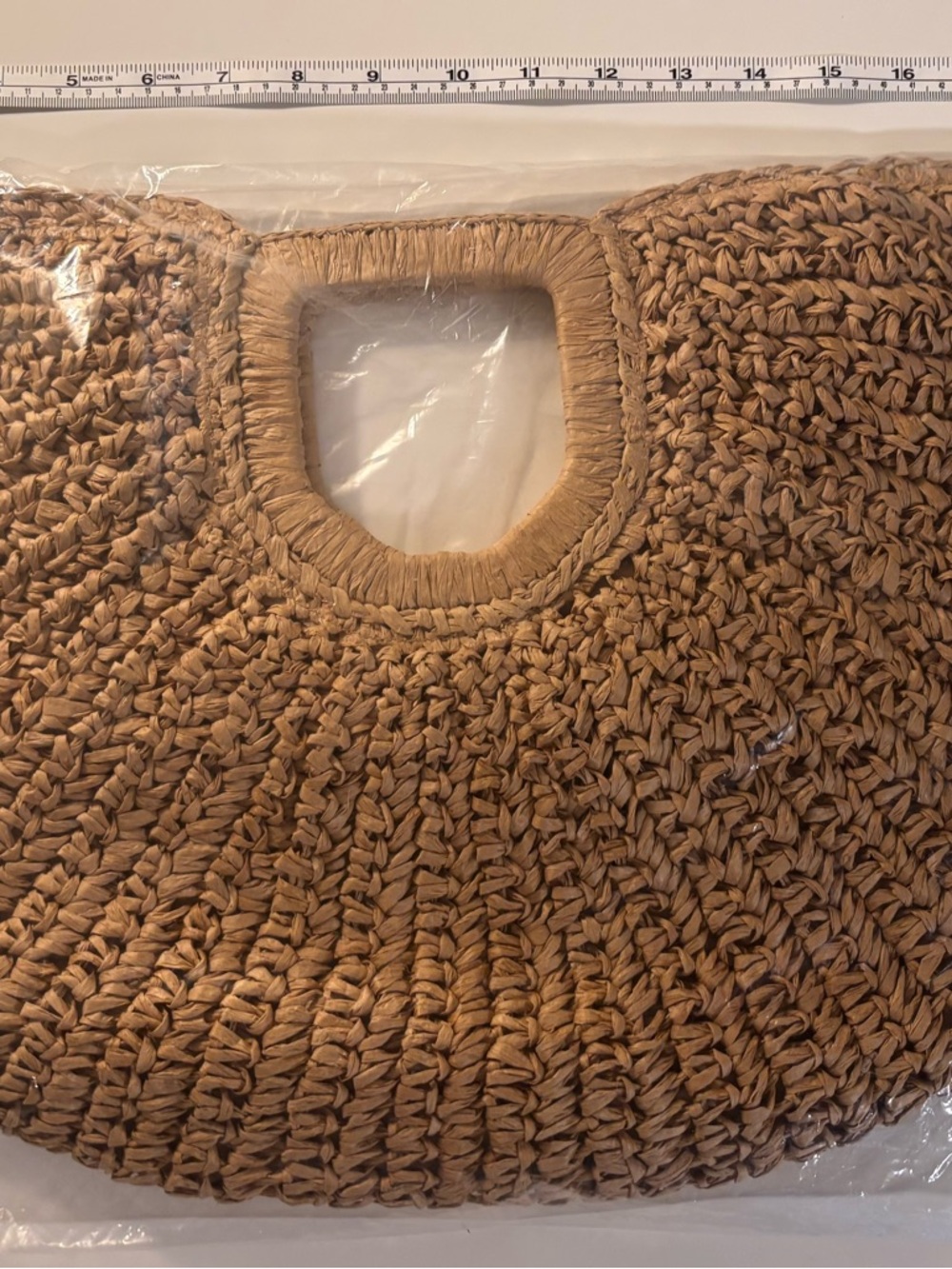 Ramla Half-Moon Clutch a Woven Straw Bag